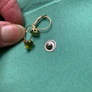 Emerald cut 10 kt gold peridot earrings